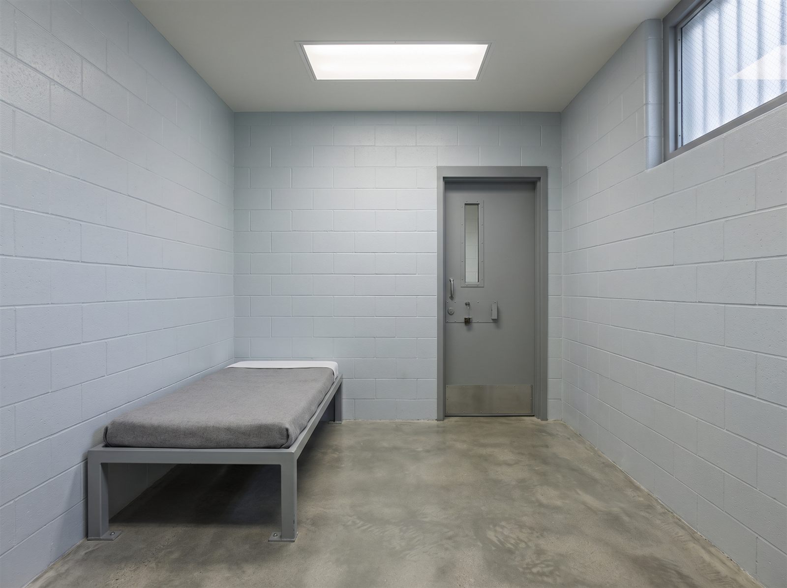 An empty medical observation room in a jail infirmary